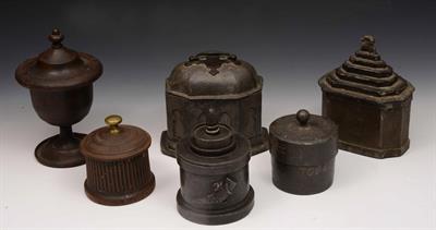 Lot 277 - A cast iron tobacco jar