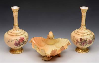 Lot 287 - A pair of Royal Worcester blush ivory vases