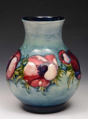 Lot 289 - A Moorcroft pale blue ground baluster vase