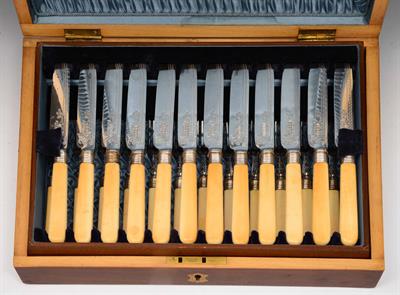 Lot 384 - A set of twelve Victorian silver plated and bone handled fish knives and forks