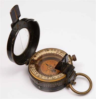 Lot 408 - A brass cased compass