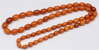 Lot 412 - A graduated amber bead necklace (not tested)