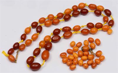 Lot 413 - A coloured amber bead necklace (not tested)