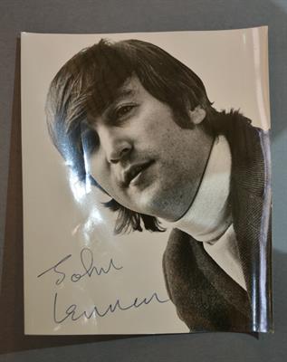 Lot 417 - A John Lennon signed photograph