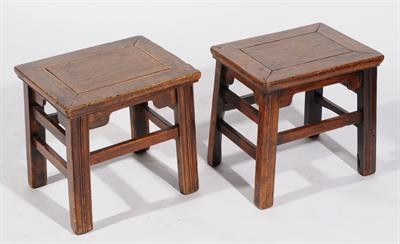 Lot 67 - A PAIR OF CHINESE PROVINCIAL ELM STOOLS