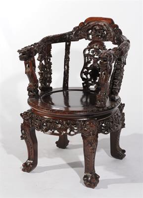 Lot 73 - A CHINESE ROSEWOOD CARVED OPEN ARMCHAIR