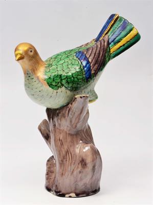 Lot 93 - A CHINESE PORCELAIN MODEL OF A PIGEON on a branch