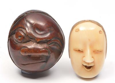 Lot 97 - A JAPANESE IVORY MASK NETSUKE carved as a female mask of Otafuku