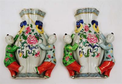 Lot 165 - A PAIR OF CHINESE FAMILLE VERTE WALL POCKET VASES