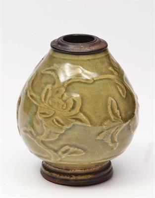 Lot 170 - A CHINESE CELADON OVOID SMALL VASE with raised foliate designs