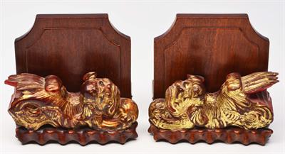 Lot 206 - A PAIR OF CHINESE CARVED GILTWOOD DOGS OF FO mounted and made into bookends