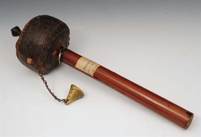 Lot 271 - A TIBETAN PRAYER WHEEL with original old paper label with ink inscription