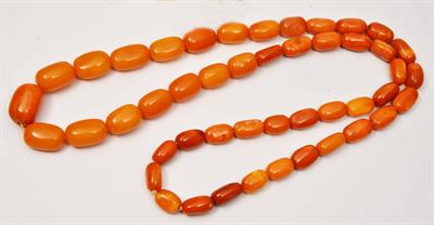 Lot 280 - AN AMBER GRADUATED BEAD NECKLACE of butterscotch colouring