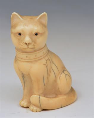 Lot 310 - A JAPANESE CARVED IVORY MODEL of a kneeling cat