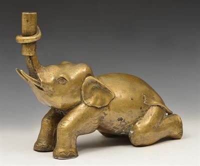 Lot 448 - AN INDIAN BRONZE STANDARD HOLDER in the form of an elephant with raised tusk