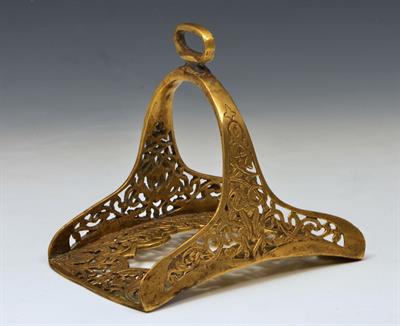 Lot 453 - AN OTTOMAN GILDED BRONZE STIRRUP with foliate scroll designs