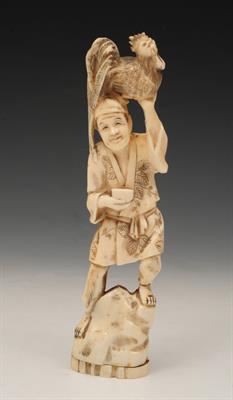 Lot 467 - A JAPANESE WALRUS IVORY CARVED OKIMONO