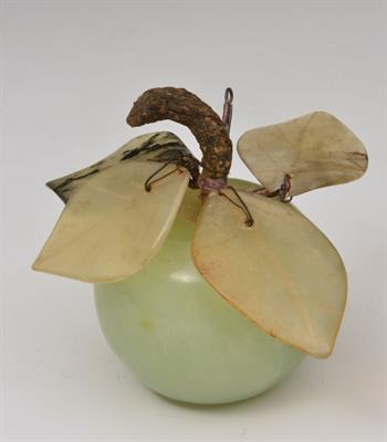 Lot 488 - A CHINESE PALE GREEN JADE APPLE with bowenite leaves on wood stalk