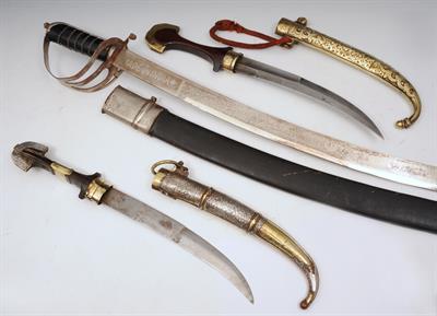 Lot 506 - A INDIAN TULWAR and two Indian daggers (3)