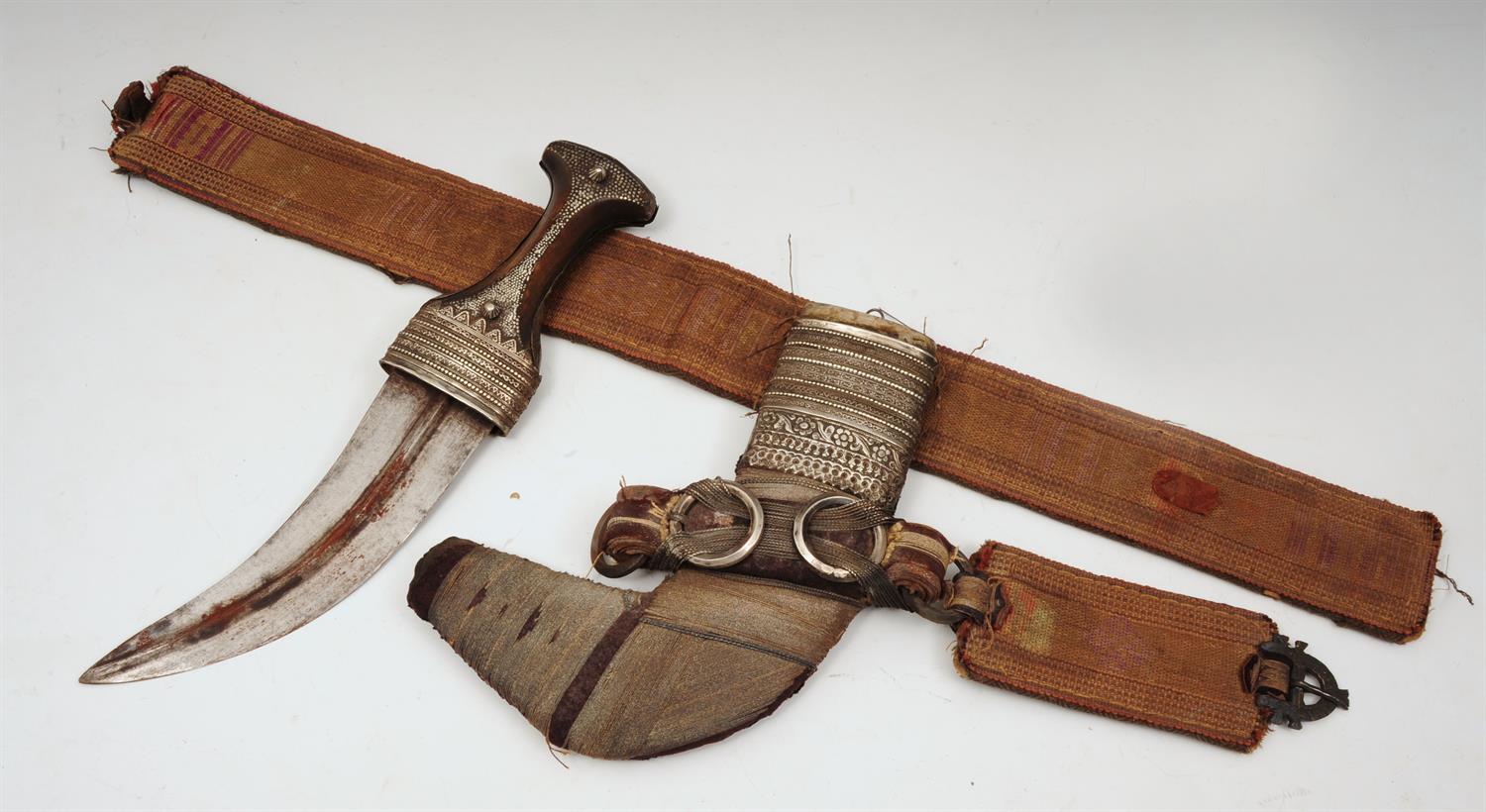 Lot 529 - AN INDO-PERSIAN DAGGER with silver metal bands and with original belt