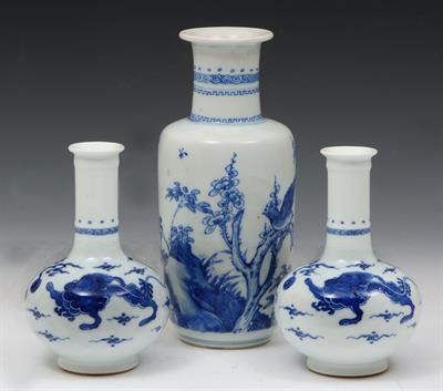 Lot 593 - A CHINESE BLUE AND WHITE SMALL ROULEAU VASE with blossom