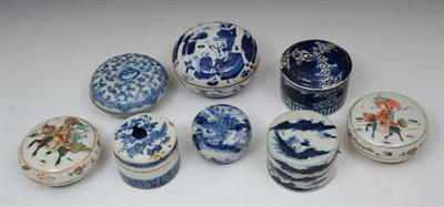 Lot 602 - A COLLECTION OF EIGHT CHINESE BLUE AND WHITE AND POLYCHROME PORCELAIN INK POTS and covers