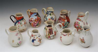 Lot 604 - A COLLECTION OF TEN CHINESE SPARROW BEAK CREAM JUGS including famille rose