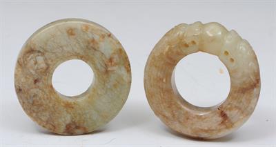 Lot 625 - TWO CHINESE CARVED JADE BI DISCS