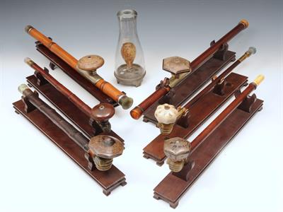 Lot 632 - A SIMILAR COLLECTION OF SIX CHINESE OPIUM PIPES and an opium lamp