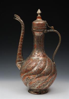 Lot 637 - A LARGE INDIAN SILVERED COPPER EWER