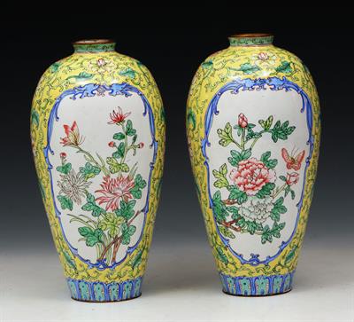 Lot 638 - A PAIR OF CHINESE YELLOW GROUND ENAMEL VASES painted with peonies and butterflies in a blue