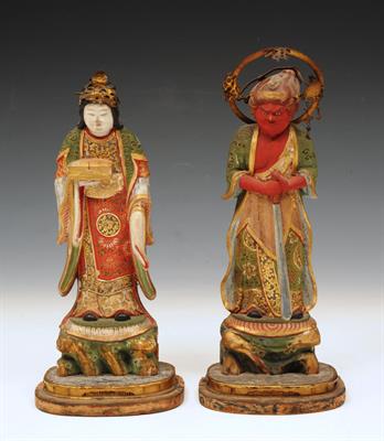 Lot 649 - A CHINESE CARVED AND GILTWOOD ATTENDANT FIGURE with offering and one other Chinese deity with sword