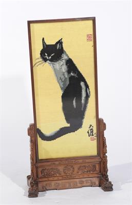 Lot 653 - A CHINESE CARVED TABLE TOP SCREEN with fret sides and mask supports