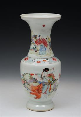 Lot 664 - A CHINESE FAMILLE ROSE VASE of baluster form painted with a lady beside a buddhist lion with an