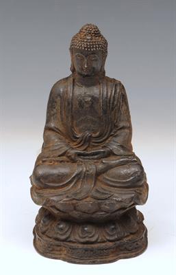 Lot 673 - A CHINESE CAST METAL SEATED BUDDHA on a lotus base