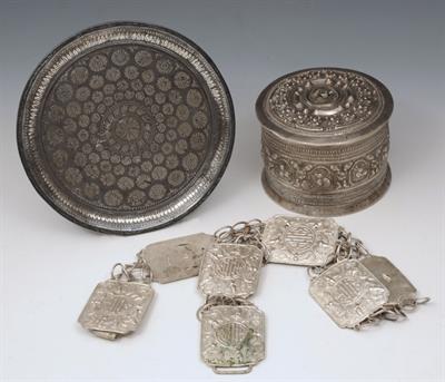 Lot 690 - A BURMESE SILVER CYLINDRICAL BOX and cover with embossed decoration