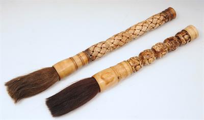 Lot 725 - TWO JAPANESE CARVED BONE CALLIGRAPHY BRUSHES