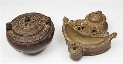 Lot 731 - A TIBETAN BRASS SPICE CONTAINER with lidded crescent cover