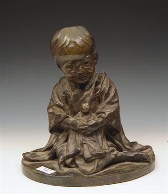 Lot 735 - A JAPANESE BRONZE MODEL of a young boy holding a doll