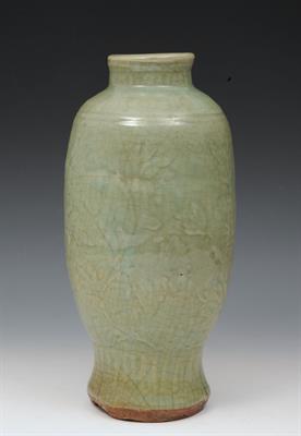 Lot 748 - A CHINESE CELADON BALUSTER VASE with leaf designs