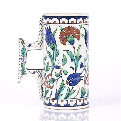 Lot 12 - Iznik style pottery tankard