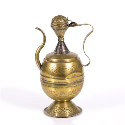 Lot 229 - Brass and copper ewer