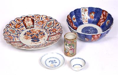 Lot 17 - A CHINESE NANKING CARGO BLUE AND WHITE TEA BOWL AND SAUCER