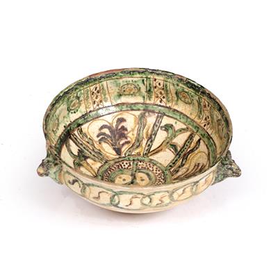 Lot 23 - AN ANTIQUE ISLAMIC POTTERY BOWL