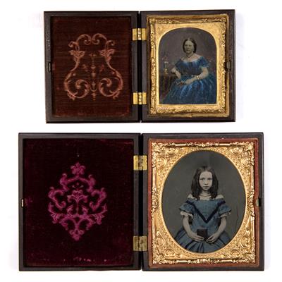 Lot 55 - A VICTORIAN AMBROTYPE depicting a young girl holding a book