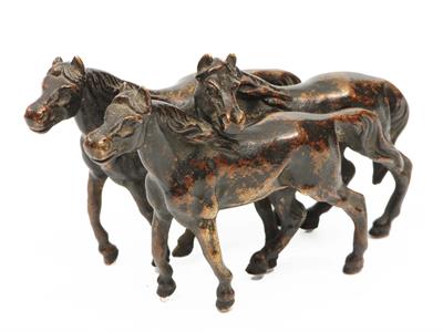 Lot 61 - A CONTINENTAL PATINATED BRONZE MINIATURE GROUP of three horses
