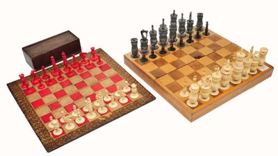 Lot 62 - A LATE 19TH CENTURY NATURAL AND BLACK STAINED BONE CHESS SET