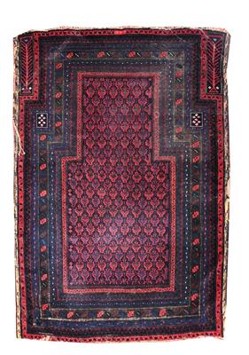 Lot 72 - AN ANTIQUE BELOUCH PART SILK PRAYER RUG with a central interlinking hooked diamond motif within a
