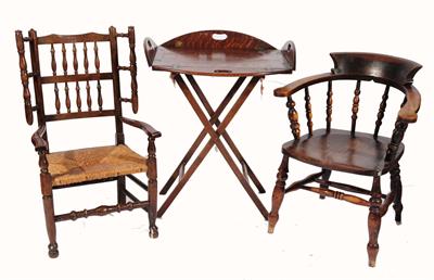 Lot 91 - A LANCASHIRE OAK ELBOW CHAIR with rush seat
