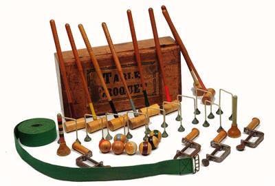 Lot 94 - AN EDWARDIAN TABLE CROQUET SET with mallets